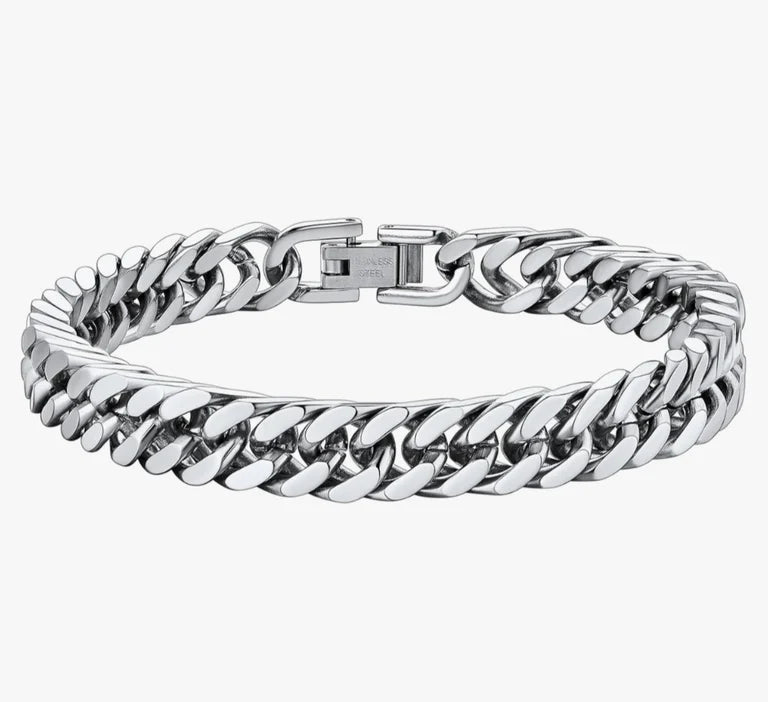 A Cuban link silver bracelet with box clasp on a white background.