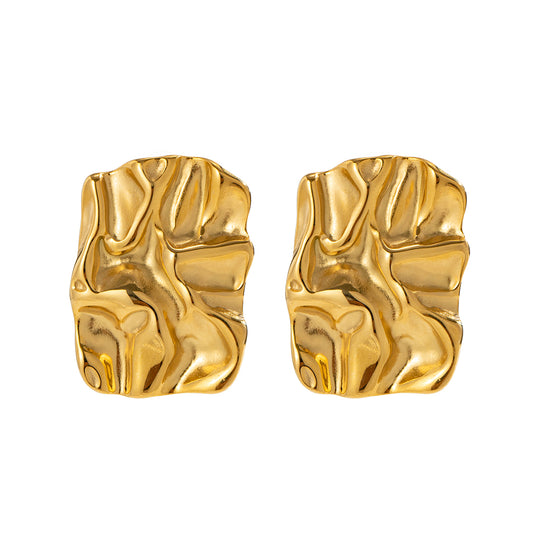 Pair of gold hammered-look stud earrings on a white background
