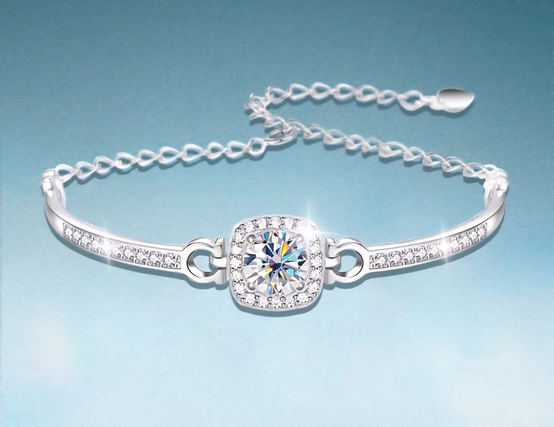 Silver bracelet with a central Moissanite crystal on a light blue background