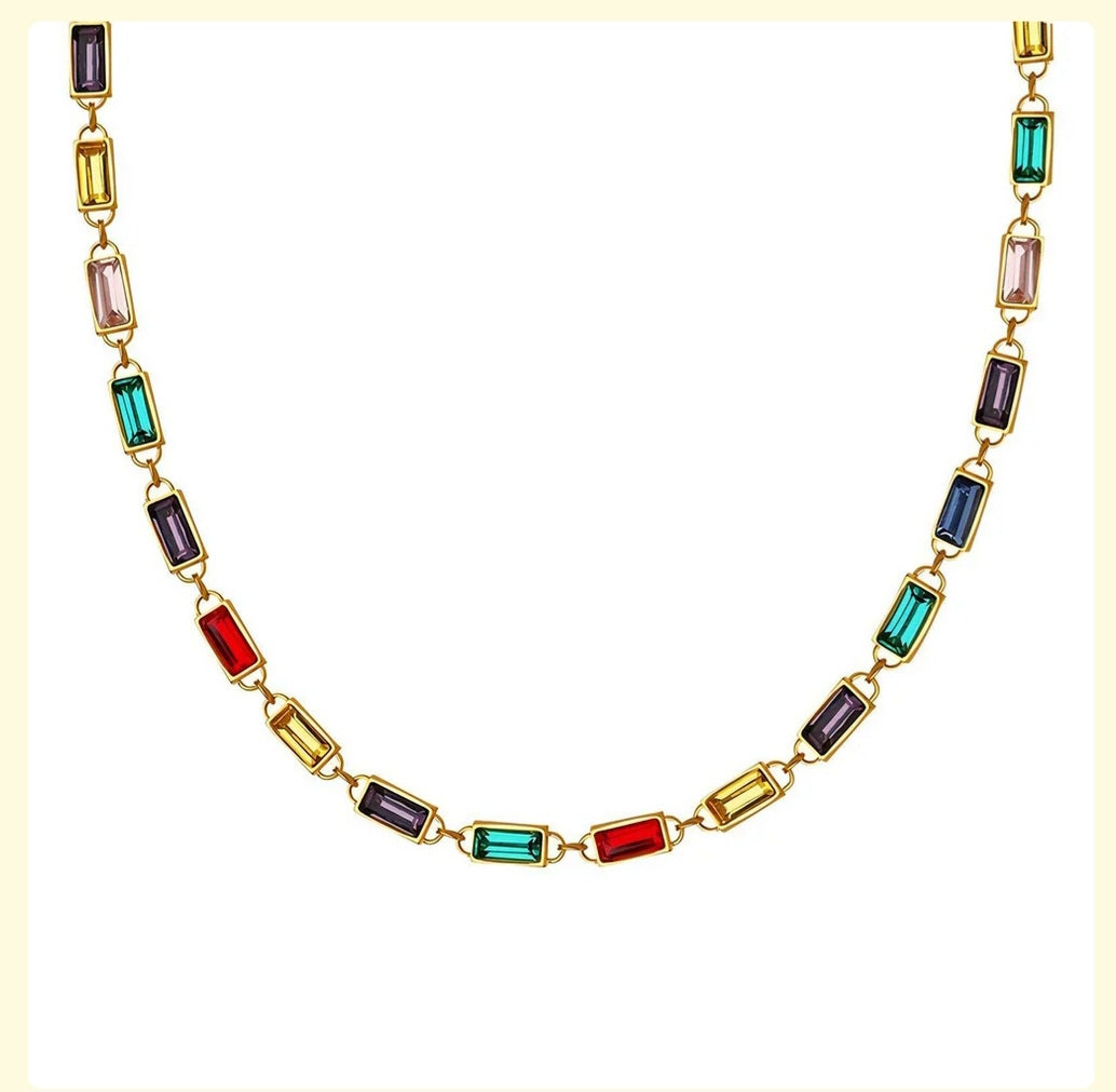 Necklace with colorful gemstones on a white background