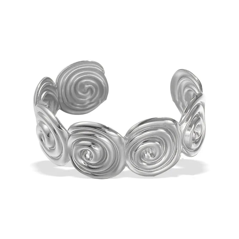 Silver spiral bracelet on a white background