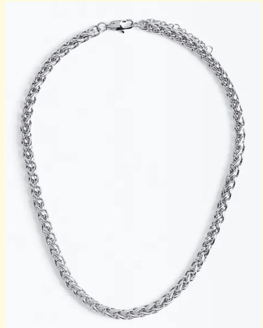 Silver chain necklace on a white background