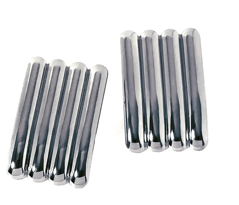 Silver earrings with textured ridges on plain white background.